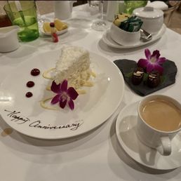Orchids signature dishes Onaga (Long-tail snapper) baked in a salt crustLasagnetteAhi TartareCoconut Cake